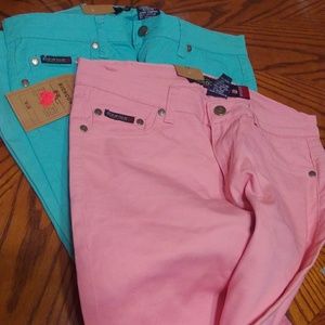 2 Capris one pink and one blue size 9 in women's.
